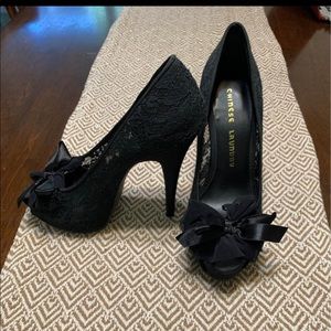 size 7 black heels with a peep toe. Chinese laundry